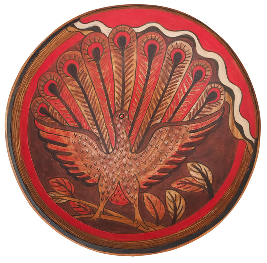 Sri Lanka: painted, decorative, terracotta plate (peacock design)