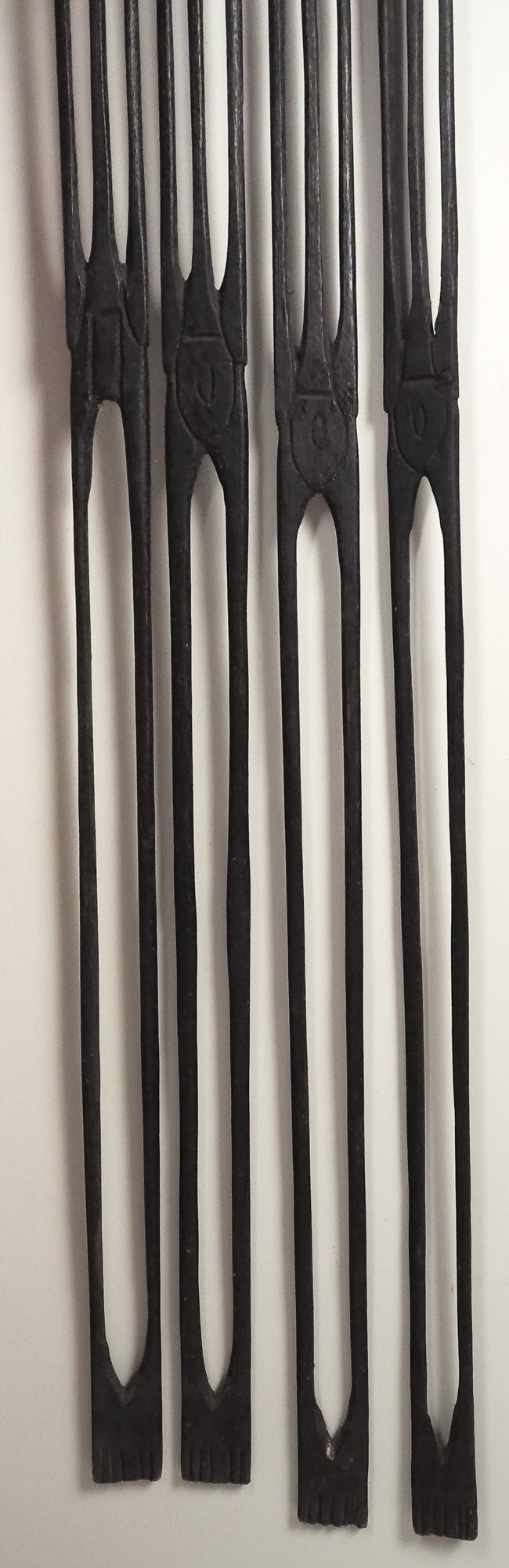 Kenya: four hand-carved, wooden stakes in tribesman design