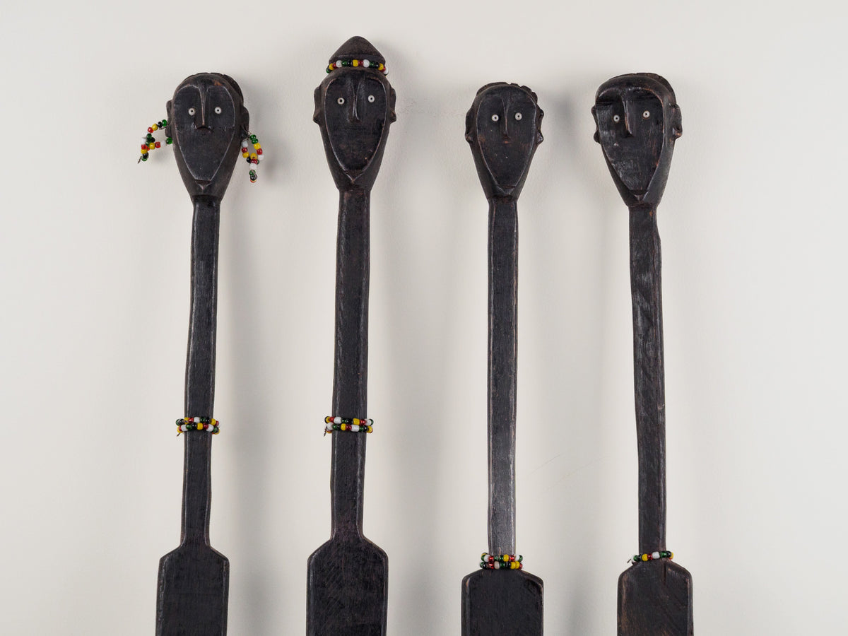 Kenya: four hand-carved, wooden stakes in tribesman design