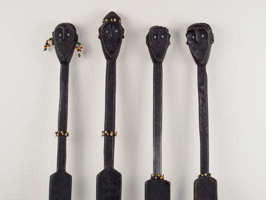Kenya: four hand-carved, wooden stakes in tribesman design
